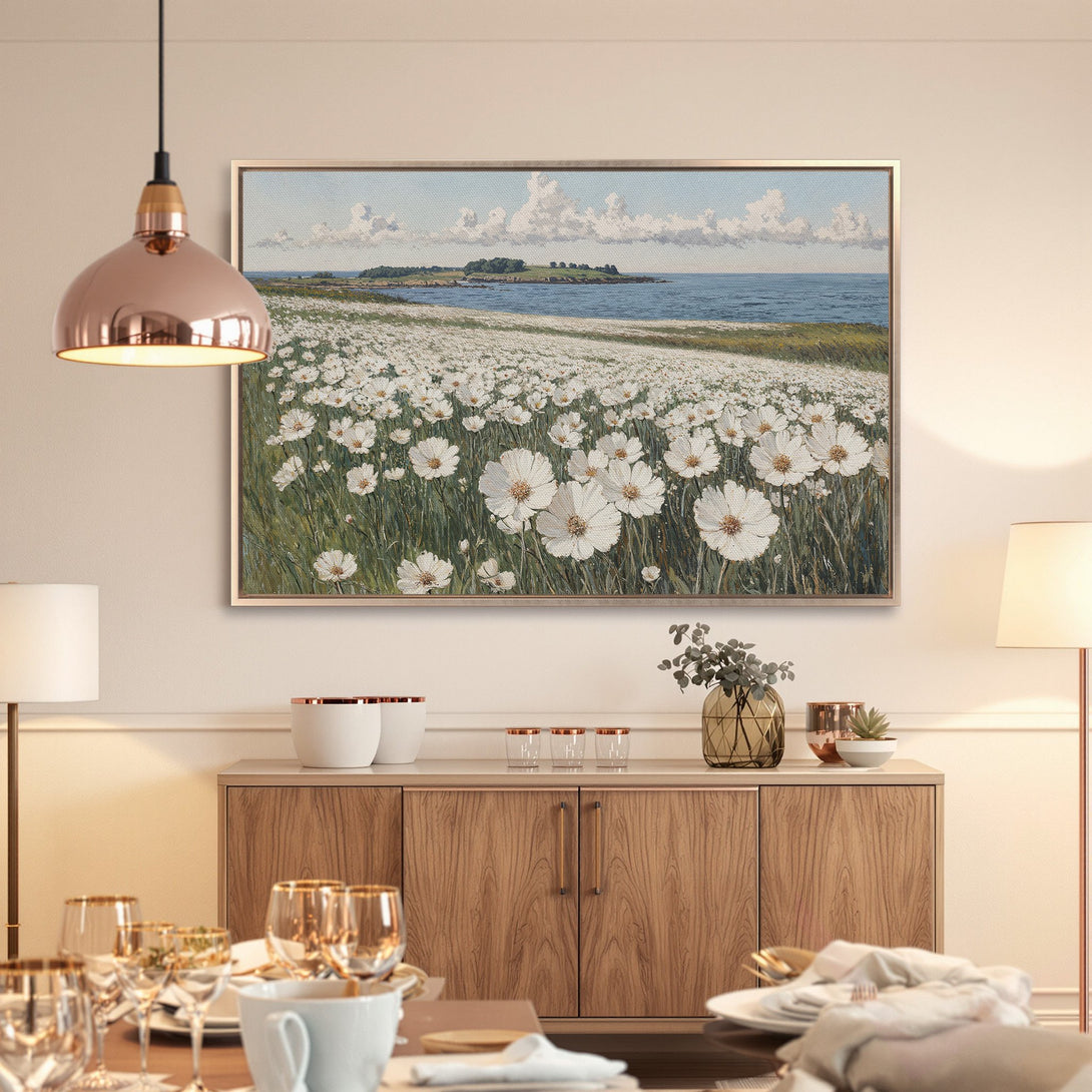 Framed Wall Art: Coastal landscape Canvas Print featuring white flowers, sea, and sky. Serene art in a soft, neutral color palette.