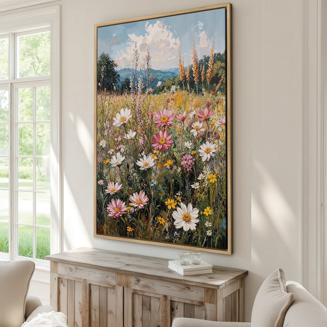 Framed Wall Art of a vibrant wildflower field painting. Impressionist style with a colorful palette of pinks, yellows, greens, and blues. Perfect for home decor.
