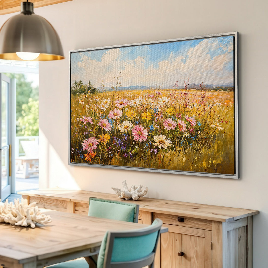 Framed Wall Art: Impressionist canvas print of a wildflower field with a warm, inviting color palette. Perfect for adding a touch of nature to your home.