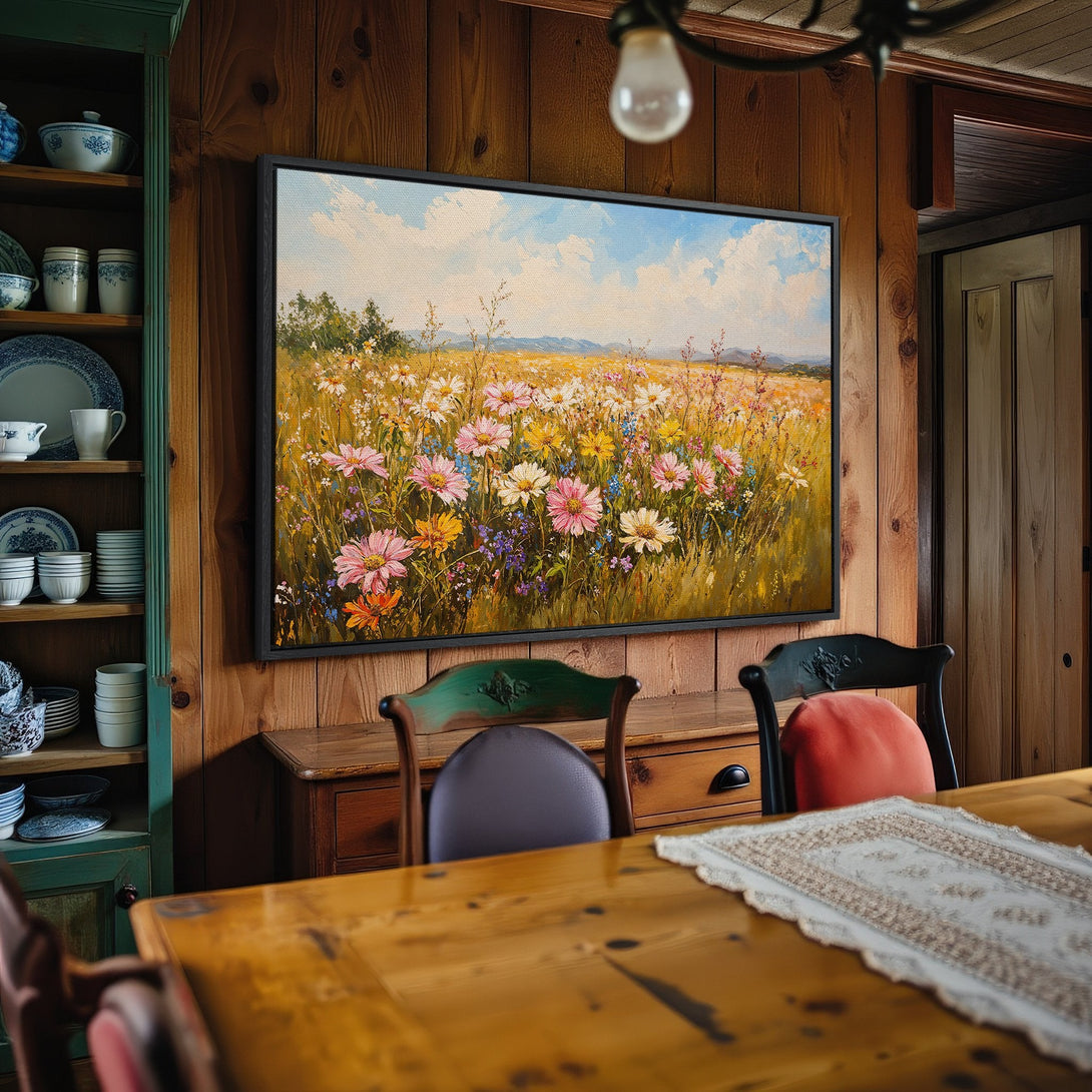 Framed Wall Art: Impressionist floral field painting with pastel pinks, yellows, and blues. Perfect for adding a touch of nature to your home decor.