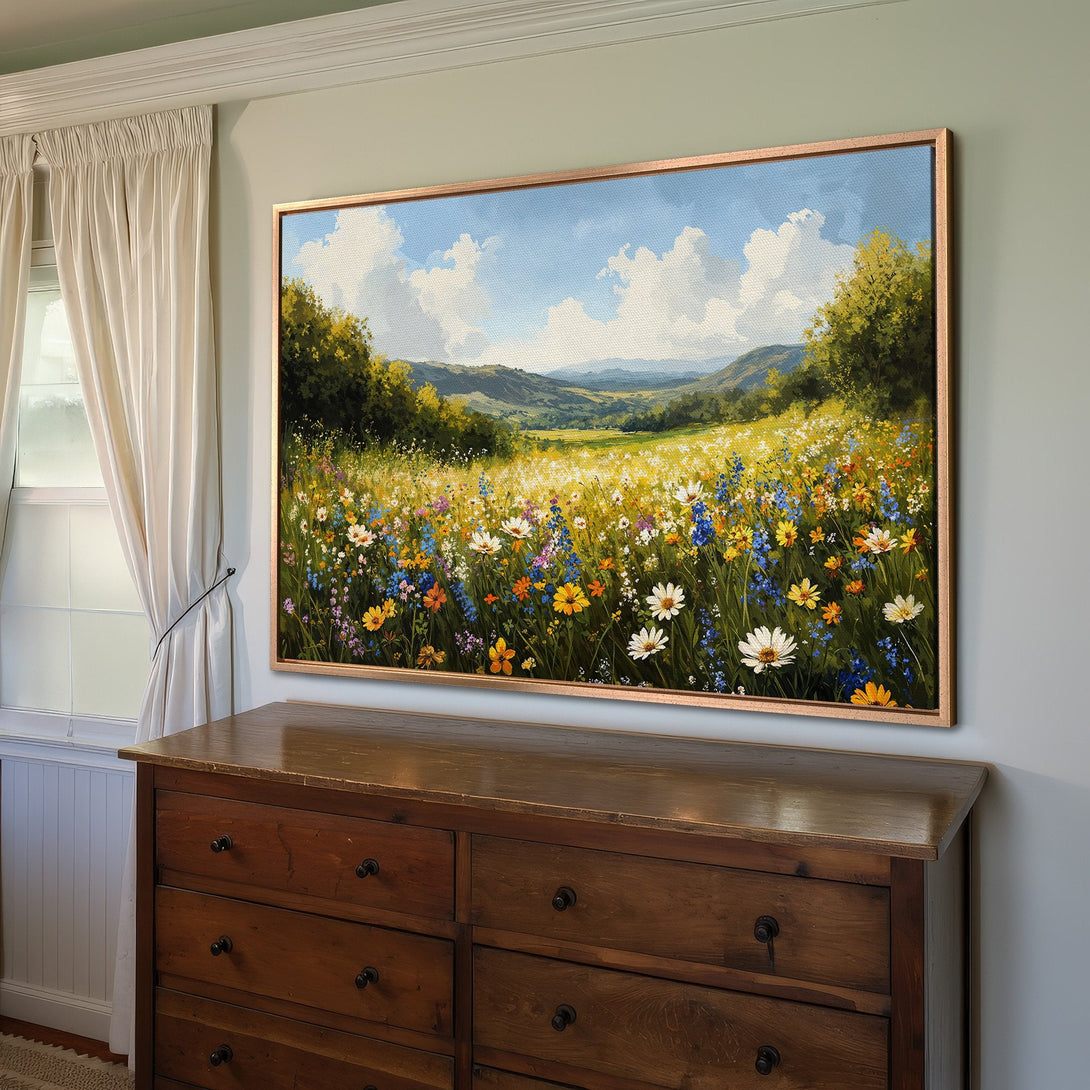 Framed Wall Art: Landscape Canvas Print with vibrant wildflowers, blue sky, and green hills. Adds a touch of nature's beauty to any room.