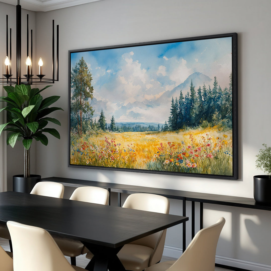 Framed Wall Art: Watercolor landscape Canvas Print with vibrant wildflowers, mountains, and sky. Adds a touch of nature with a warm, inviting color palette.