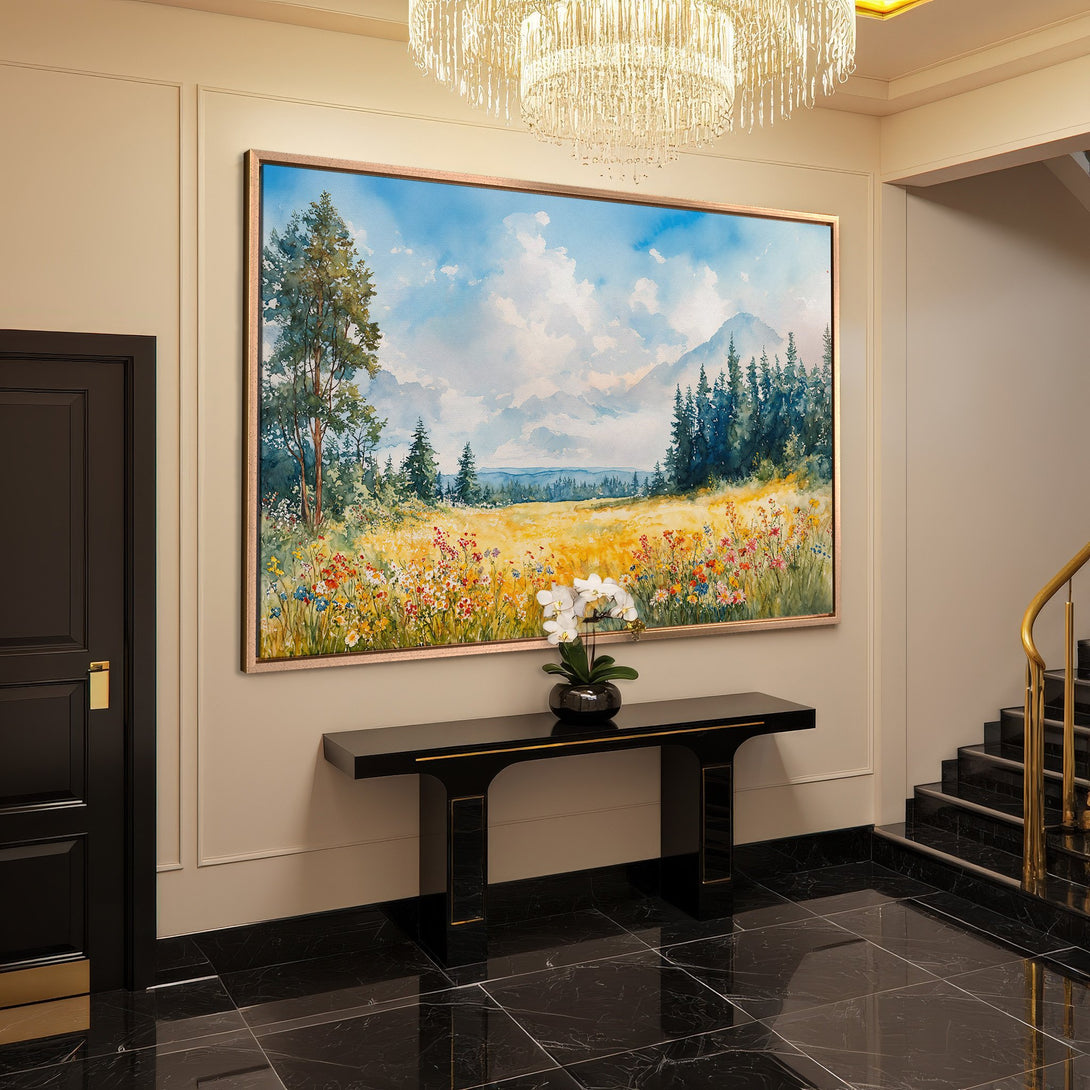 Framed Wall Art: Watercolor landscape Canvas Print in a modern interior. Features a meadow with blue, green, and yellow hues.