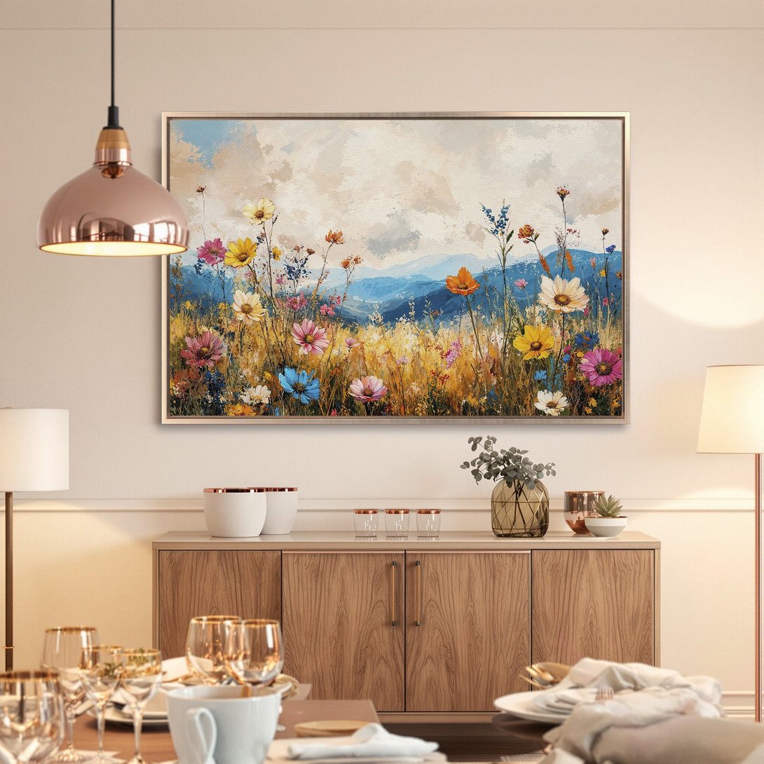 Framed Wall Art featuring a vibrant wildflower meadow scene. Impressionistic style with a colorful palette of blues, yellows, and pinks. Perfect for any room!