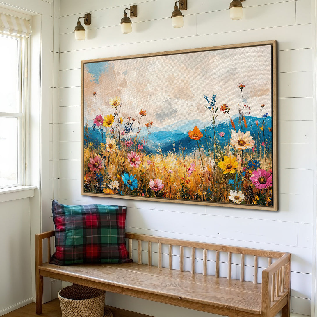 Framed Wall Art: Vibrant floral meadow canvas print in a rustic interior. Features colorful wildflowers and a warm, inviting color palette. Perfect home decor!
