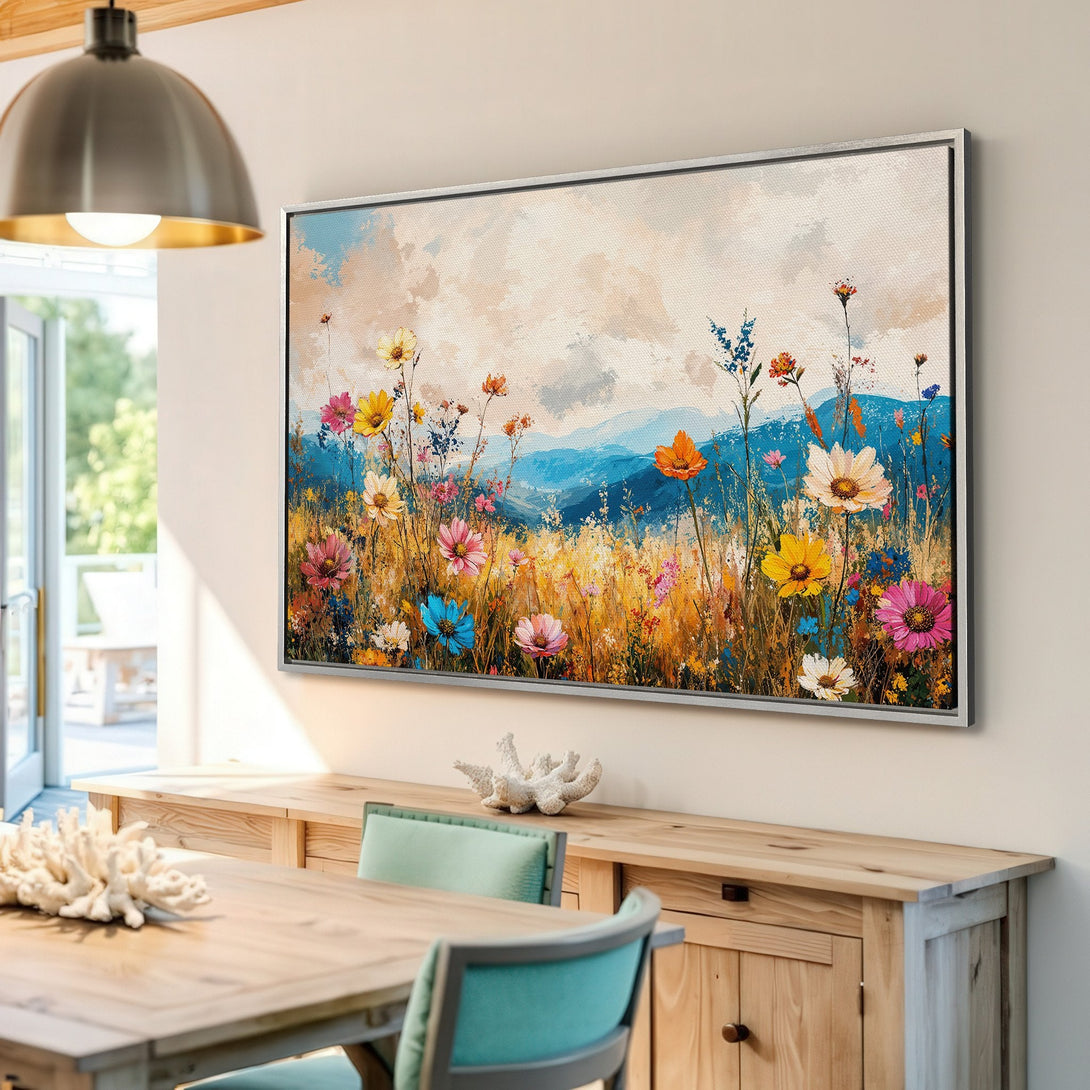 Framed Wall Art: Colorful wildflower meadow canvas print. Impressionistic style with vibrant blues, yellows, pinks, and oranges. Perfect for adding a pop of color!