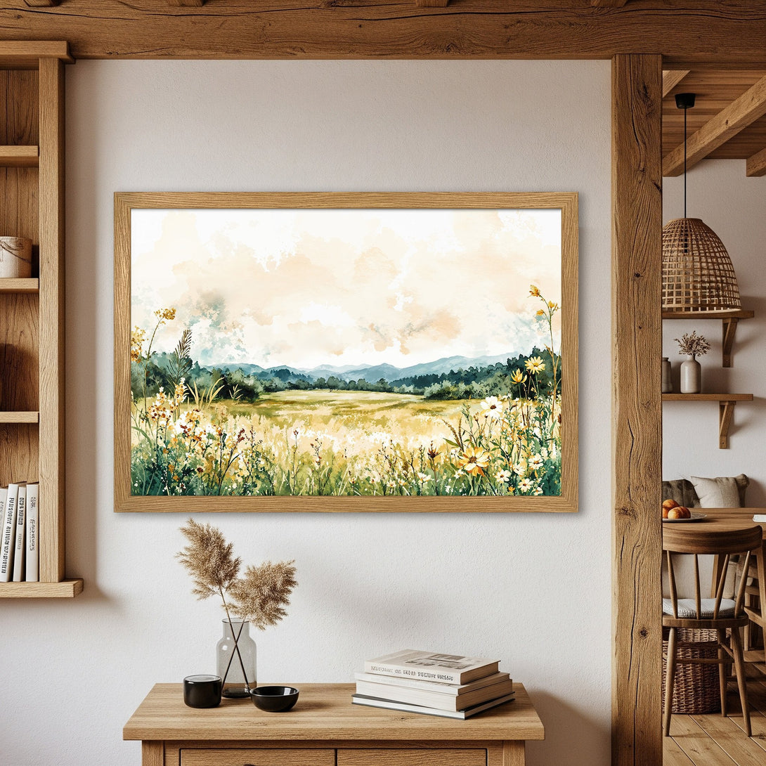 Framed Poster featuring a watercolor landscape with a meadow, mountains, and a warm color palette. Perfect wall art!
