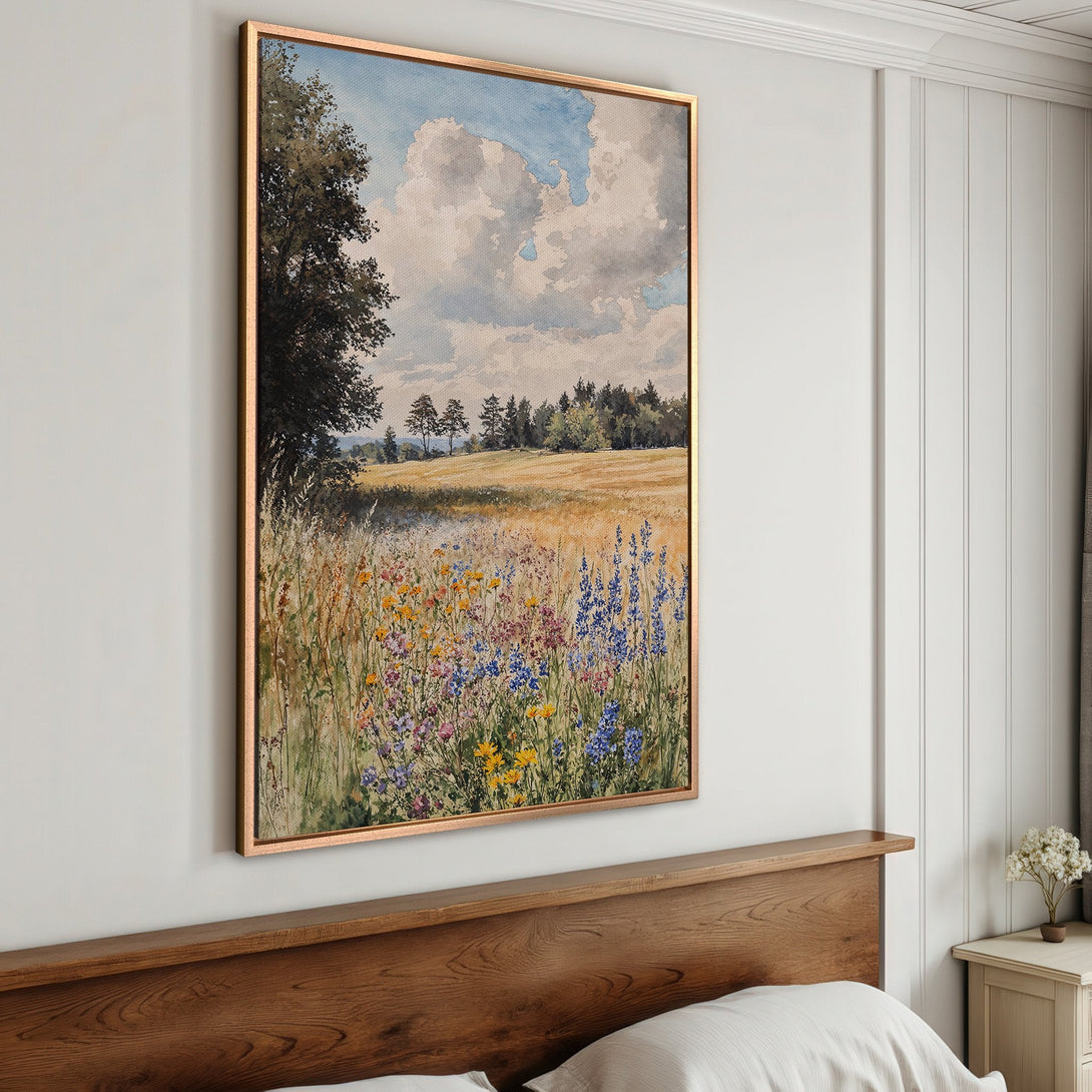 Framed Wall Art: Watercolor landscape Canvas Print with a field of wildflowers. Earthy tones with pops of blue, yellow, and pink. Perfect for bedroom decor.
