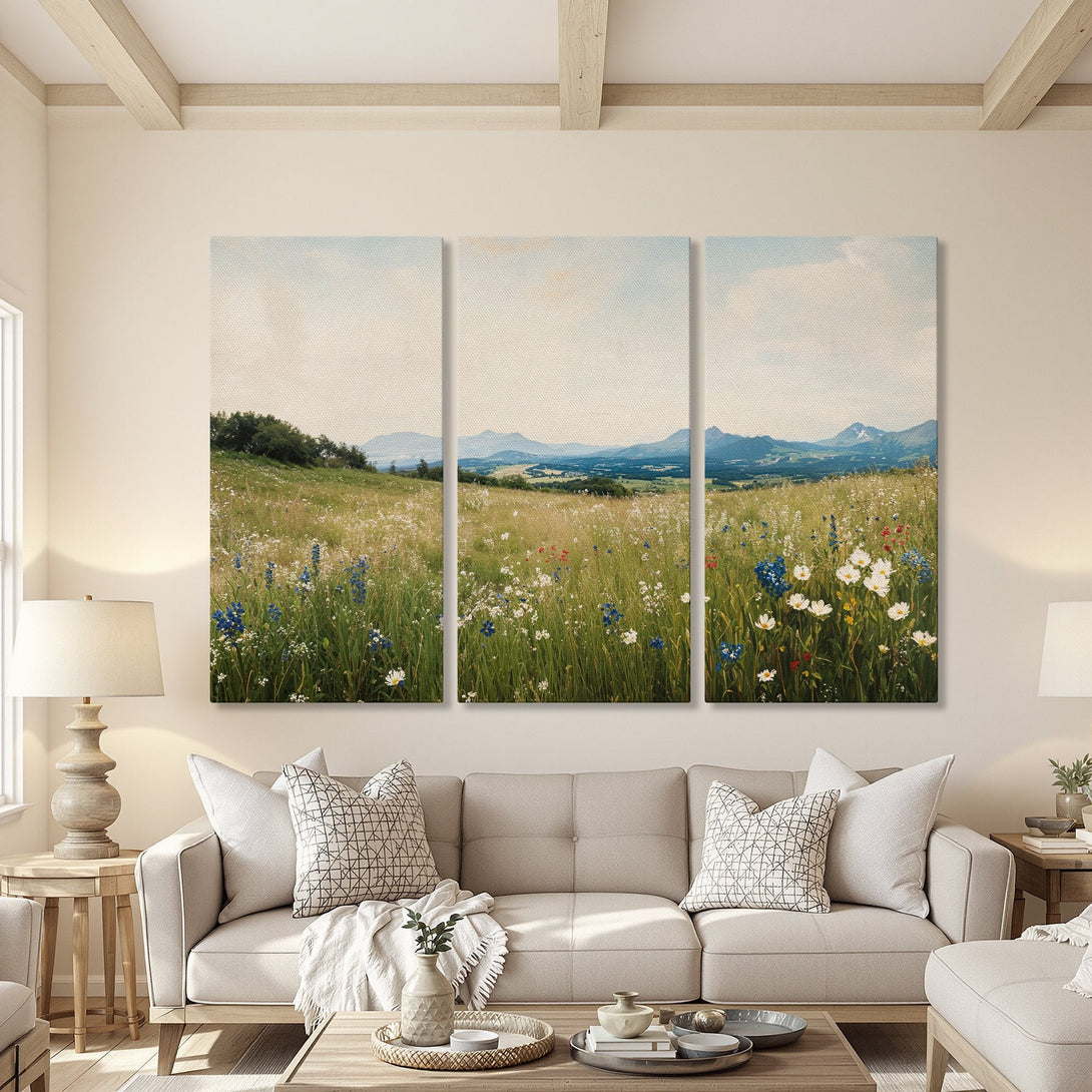 Canvas Print triptych of a wildflower meadow in a light, airy style. Features a natural color palette with blues, greens, and beige tones.