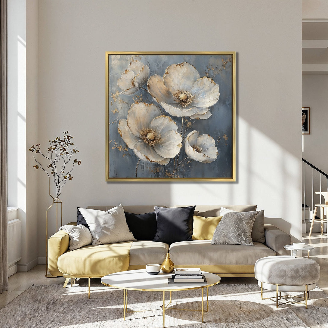 Canvas Print of elegant white floral art with gold accents, displayed in a stylish interior with a blue and orange color palette.