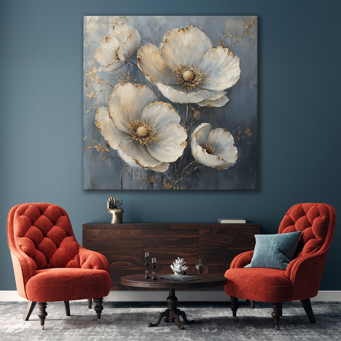 Framed Wall Art featuring elegant white floral art with gold accents on a blue-grey background. Perfect for modern living room decor.
