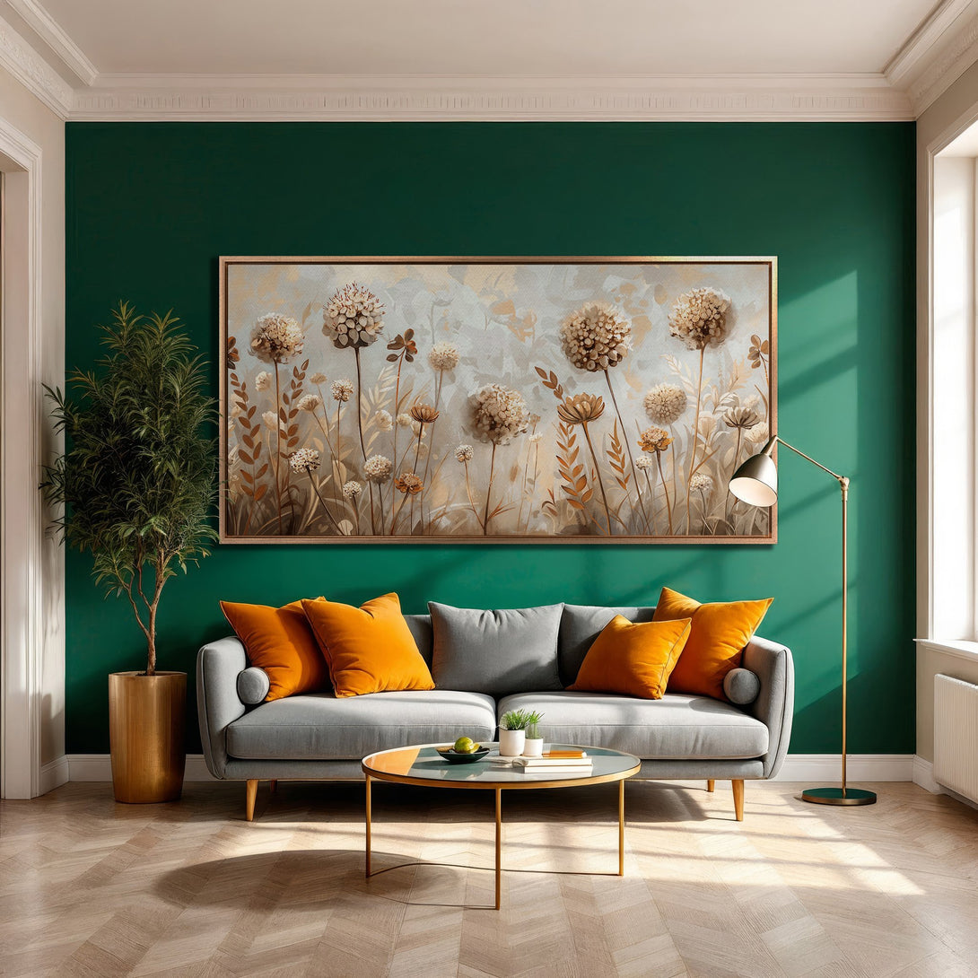 Framed Wall Art featuring botanical print in neutral tones. Elegant interior design with a green wall, grey sofa, and orange accents.