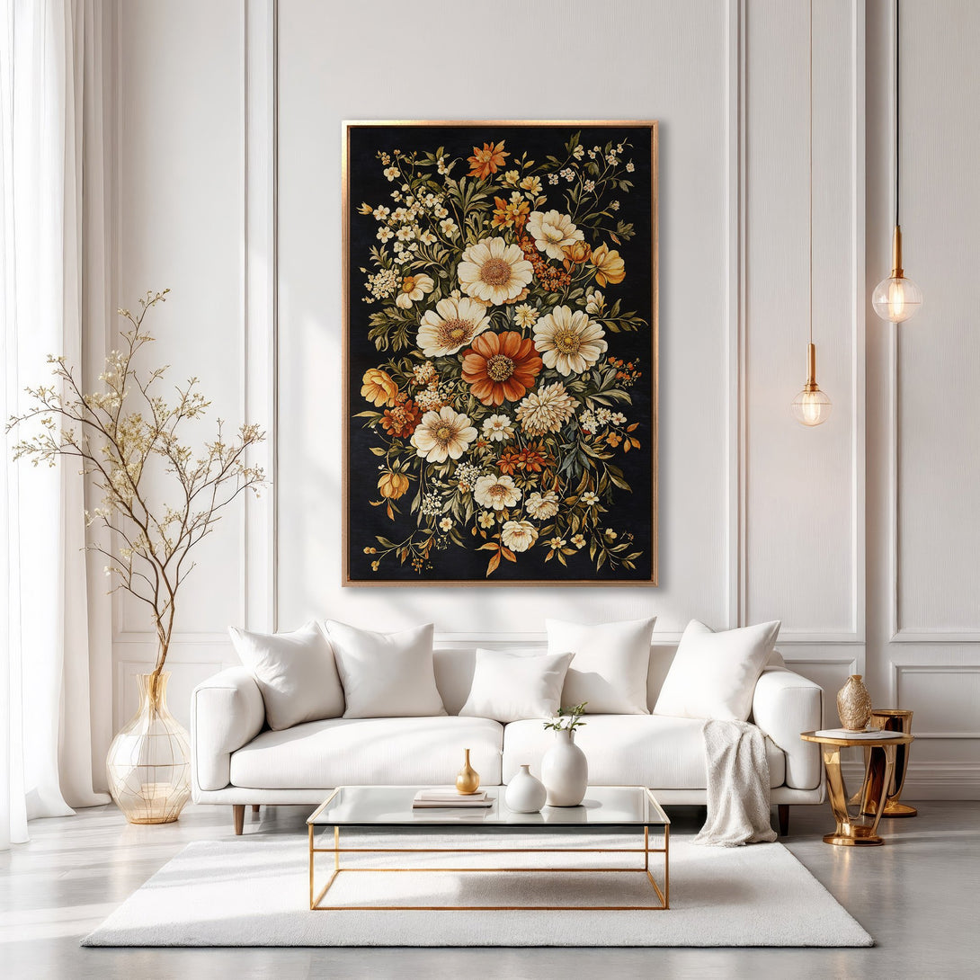 Framed Wall Art: Floral Canvas Print in a modern living room. Features a black background with cream, orange, and yellow flowers. Adds elegance and style.