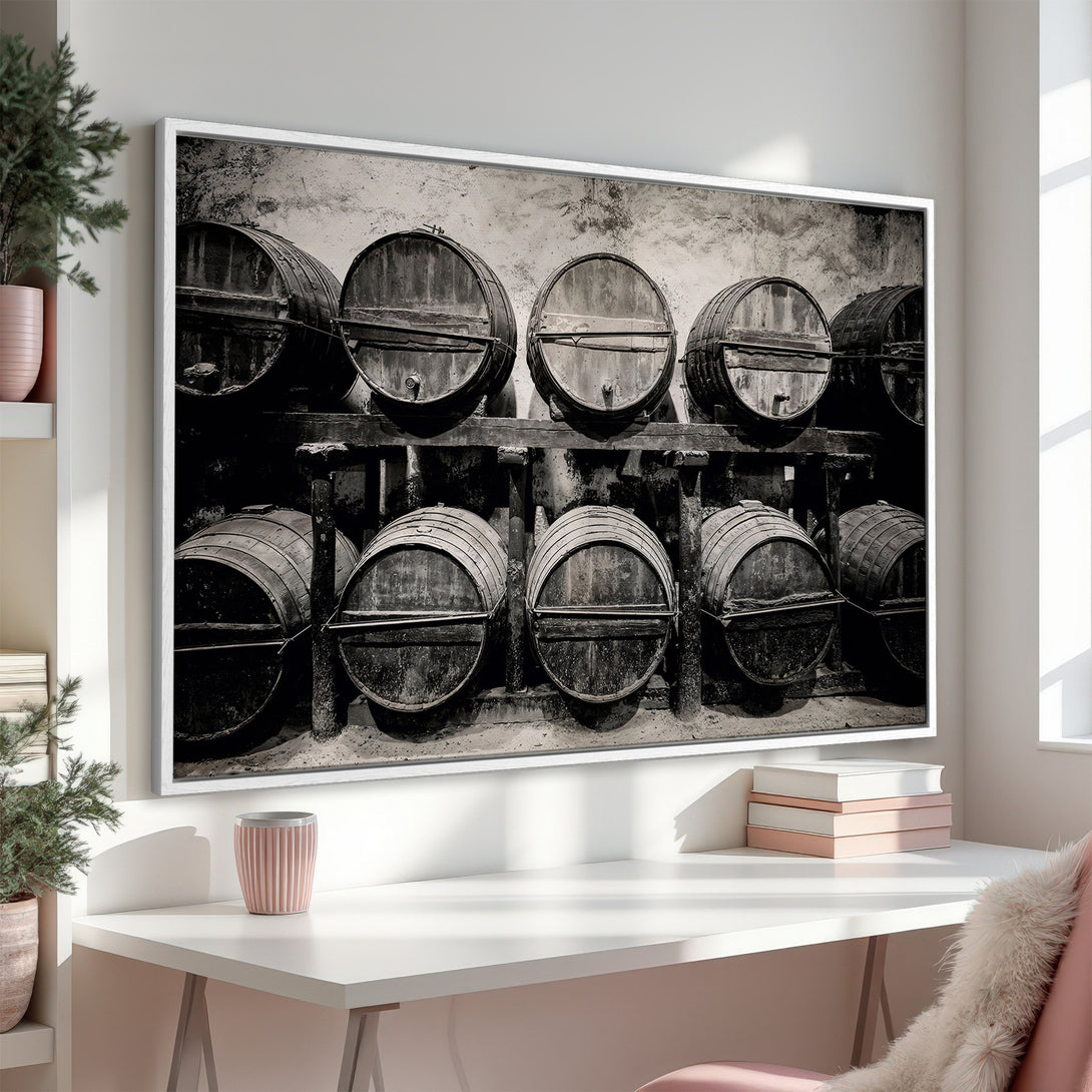 Framed Wall Art featuring a black and white photo of wine barrels. Rustic style with neutral tones, perfect for adding character to any space.