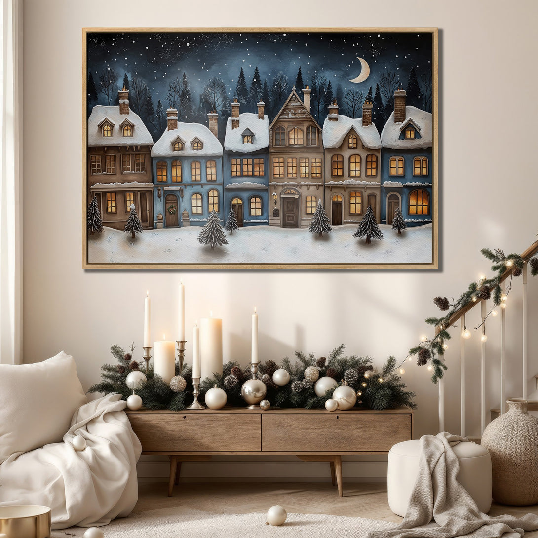 Framed Wall Art of a winter village scene with a blue and brown color palette. Cozy, illustrated style perfect for holiday decor.