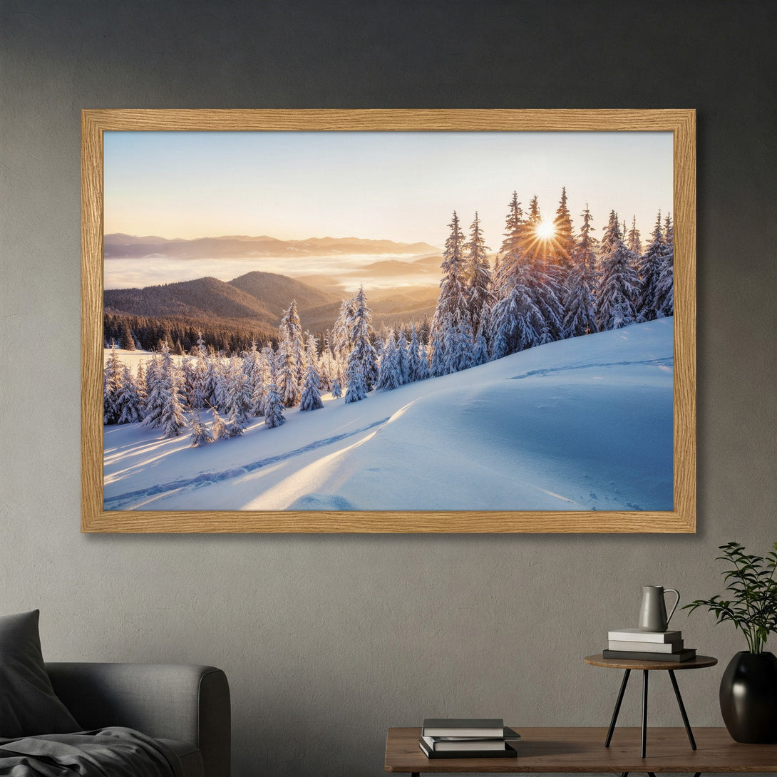 Framed Poster of a winter landscape with snow-covered trees and mountains. Warm, golden light and cool blue/white tones create a serene, nature-inspired aesthetic.