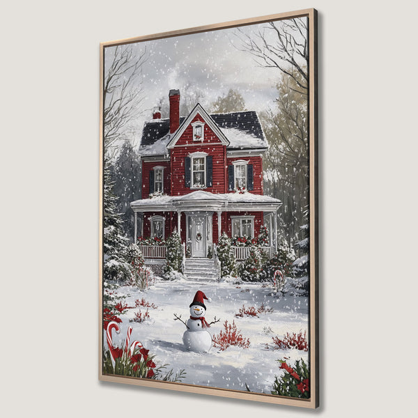 Framed Wall Art of a charming red house in a snowy winter scene. Festive holiday decor with a snowman, candy canes, and a warm, inviting color palette.