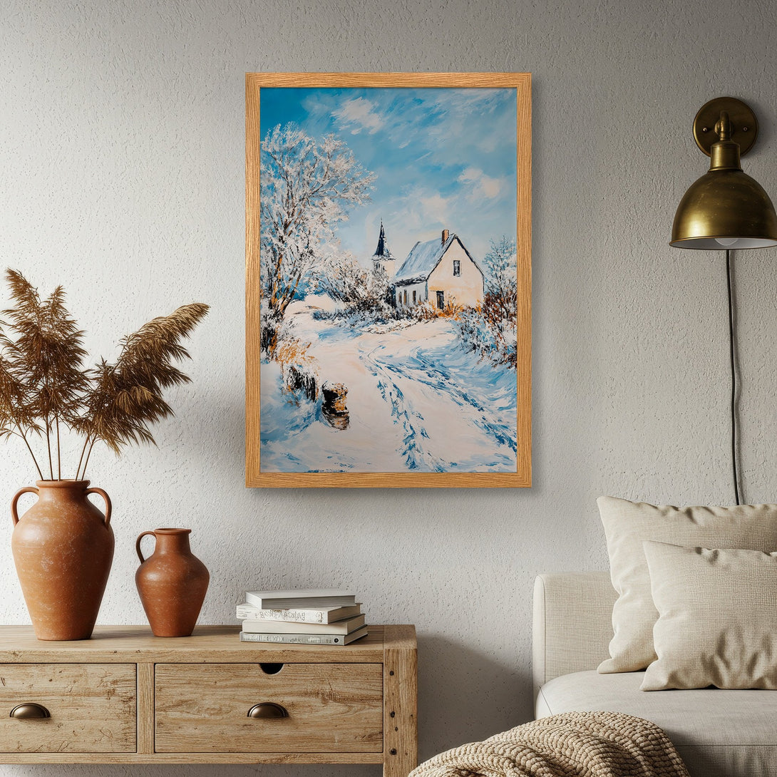 Framed Poster of a winter landscape painting. Featuring a snowy scene with a house and church, in cool blue and white tones. Perfect wall art!