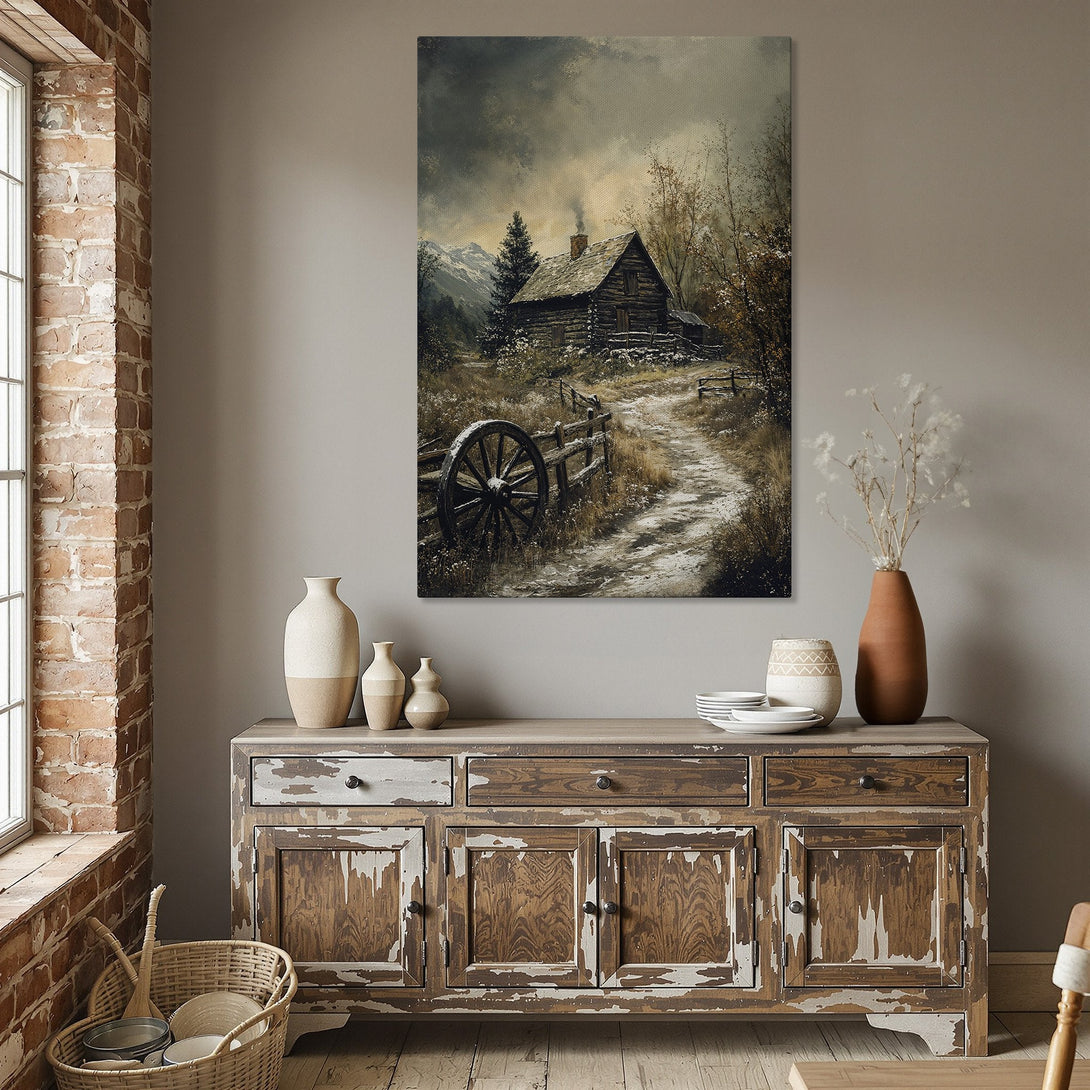 Framed Wall Art: Rustic cabin landscape canvas print in muted earth tones. Perfect for adding a touch of cozy charm to your dining room decor.