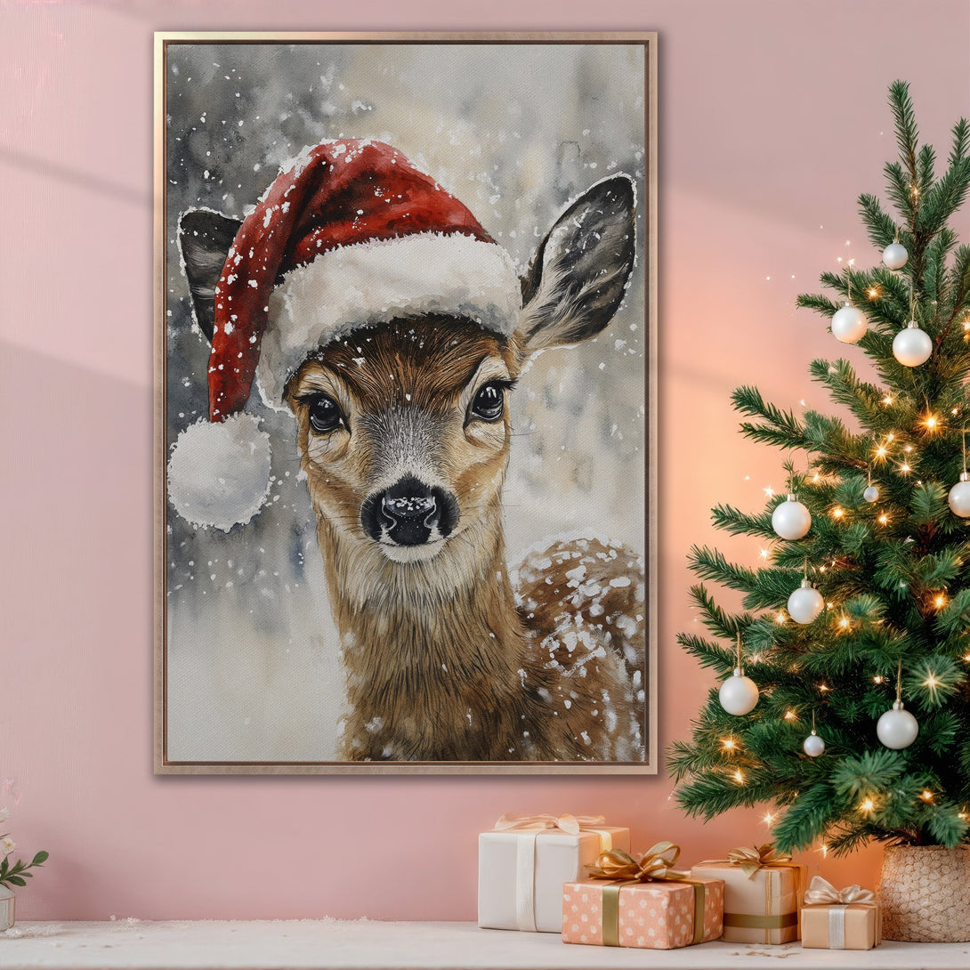 Framed Wall Art: Watercolor painting of a deer in a Santa hat. Warm, neutral tones with a touch of festive red. Perfect Christmas decor!