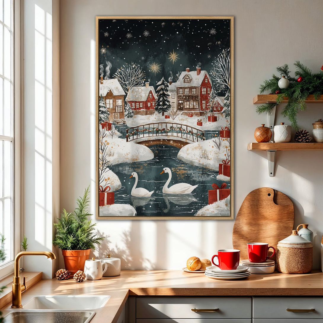 Framed Wall Art: Winter scene Canvas Print with snow-covered village, swans, and bridge. Cozy, watercolor style with a dark blue, red, and white color palette.