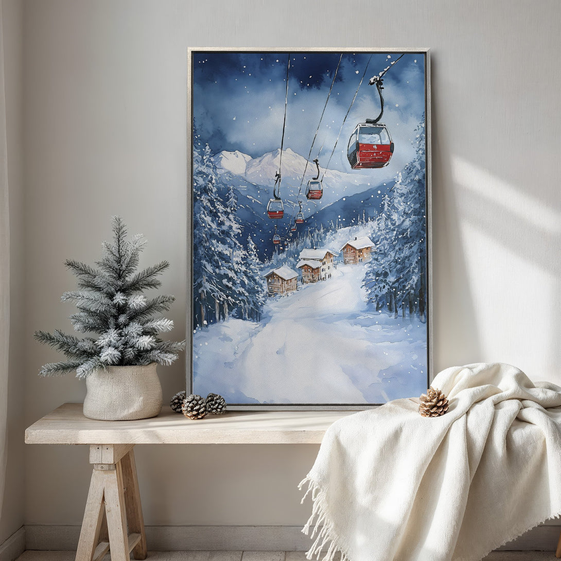 Framed Wall Art: Watercolor ski resort scene with red gondolas, snowy mountains, and blue & white color palette. Perfect winter decor for your home!
