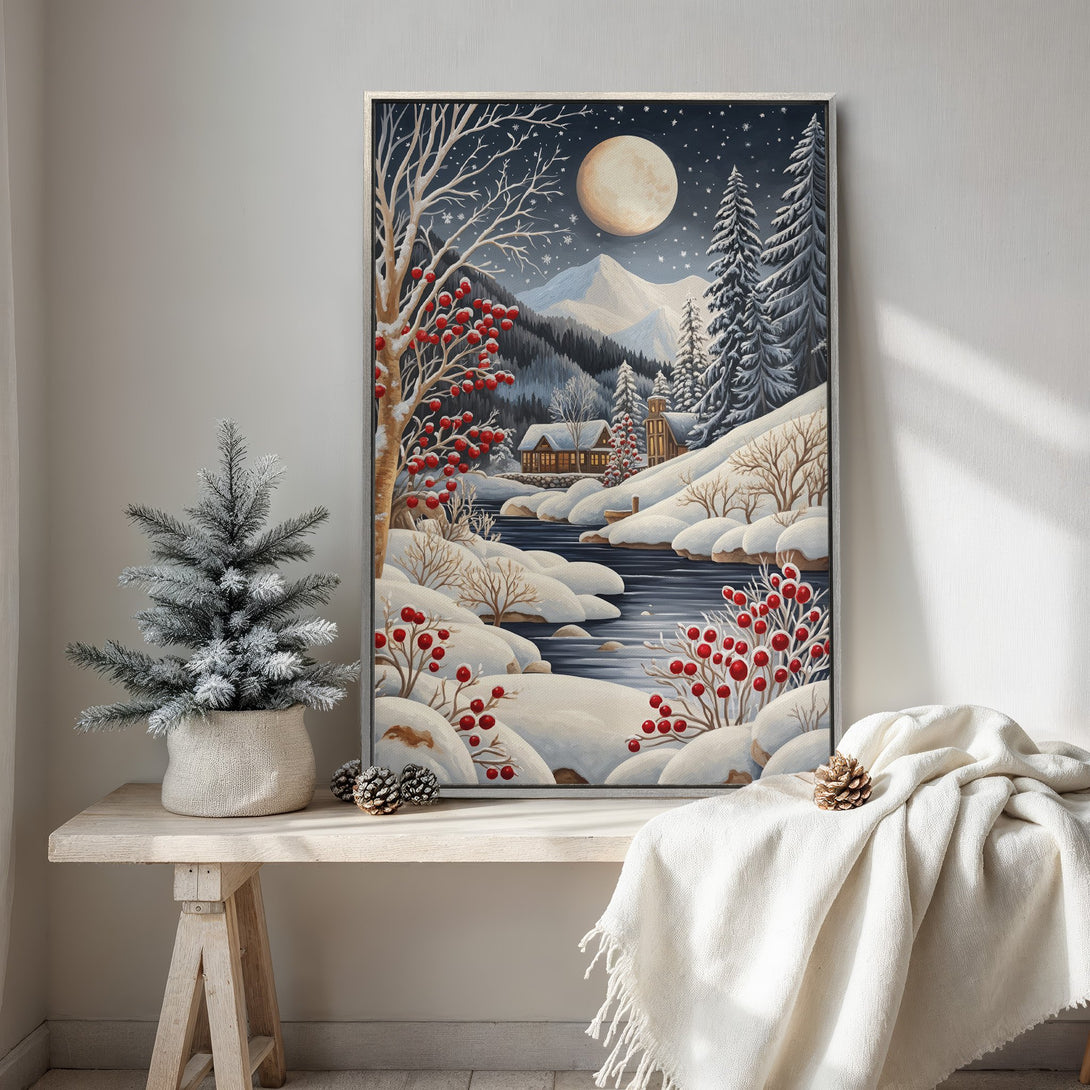 Framed Wall Art: Winter landscape canvas print with a cozy cabin scene, featuring a serene blue and white color palette with pops of red. Perfect for holiday decor!