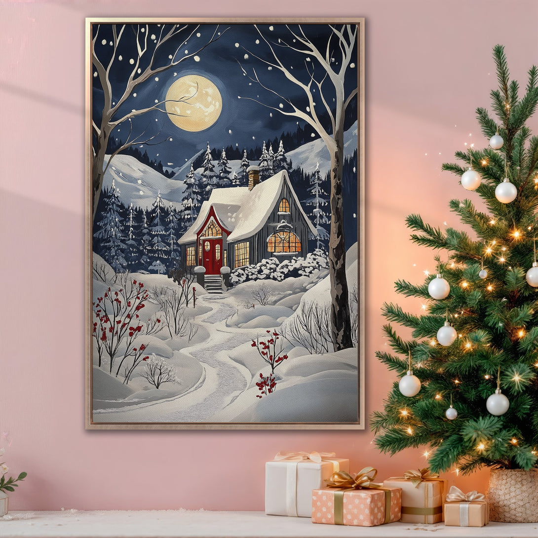 Framed Wall Art: Winter landscape Canvas Print with a cozy cabin under a full moon. Featuring a blue, white, and red color palette, perfect for holiday decor.