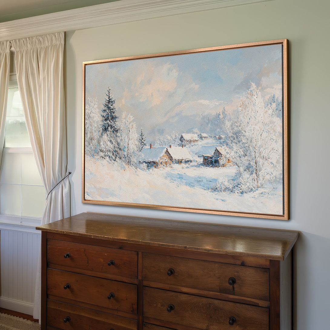 Framed Wall Art: Winter landscape Canvas Print with a cozy cabin scene in a cool blue and white palette. Perfect for adding a touch of serenity to your home.