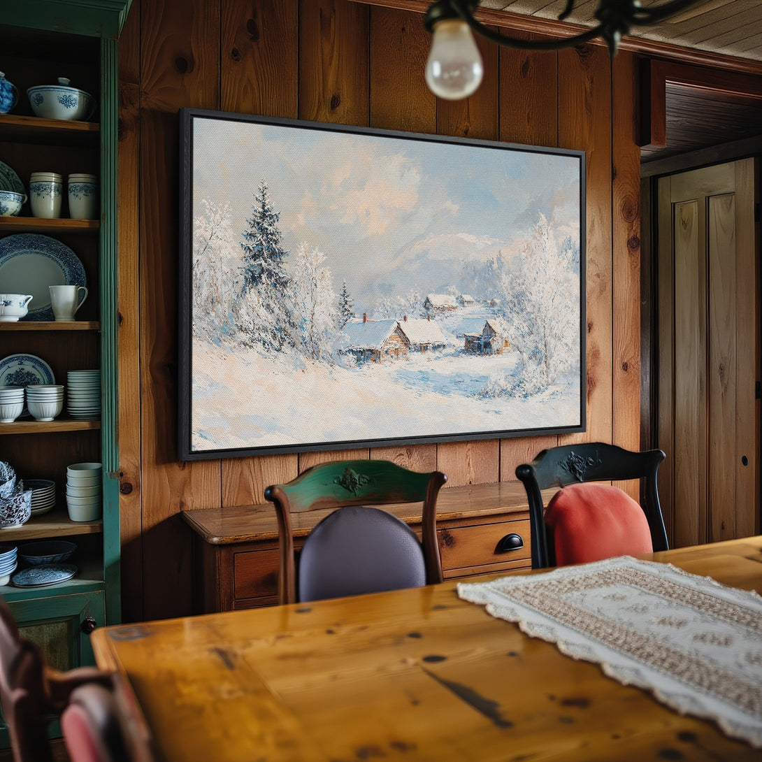 Framed Wall Art: Winter landscape Canvas Print with snowy cabins, serene blues, and whites. Perfect for rustic home decor. Bring the outdoors in!