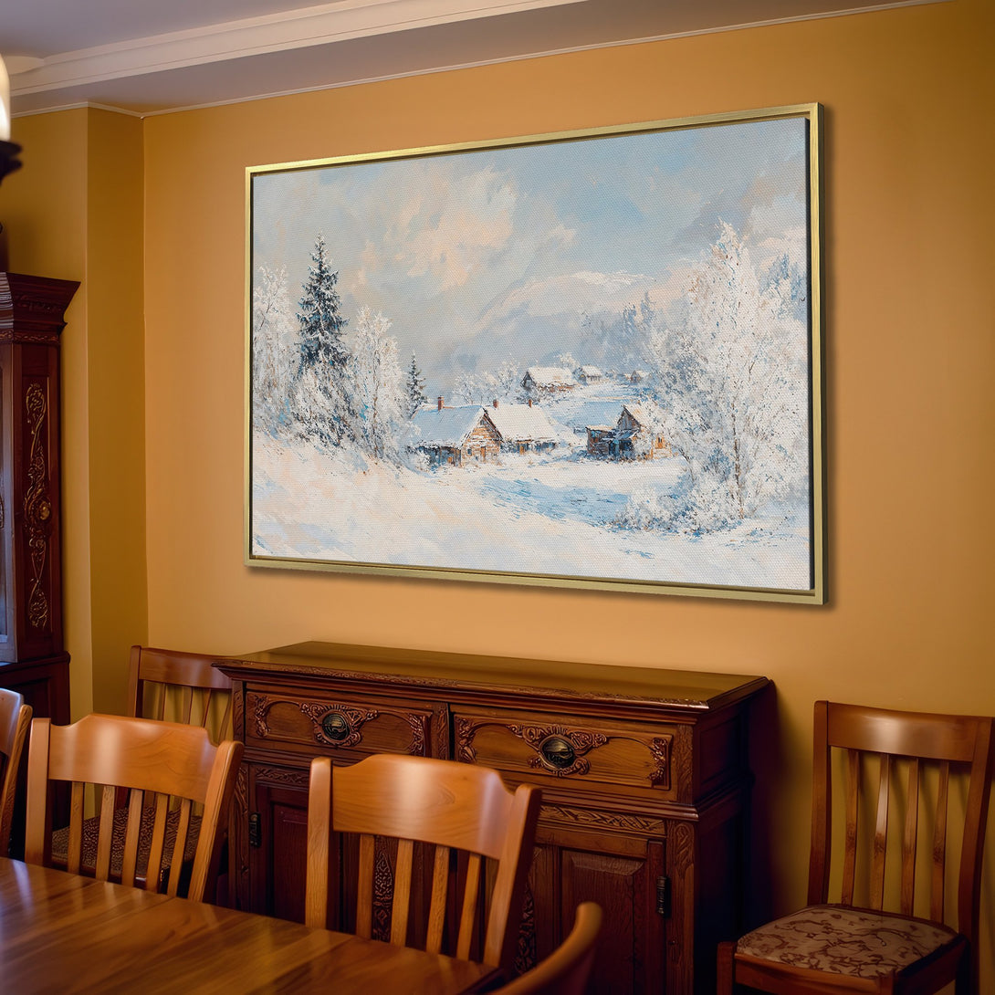 Canvas Print of a winter landscape painting in a neutral interior. Features snowy trees and cabins, with a cool blue and white color palette.