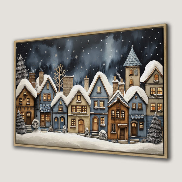 Framed Wall Art of a charming winter village scene. Watercolor style with a blue, brown, and cream color palette. Perfect for cozy home decor.