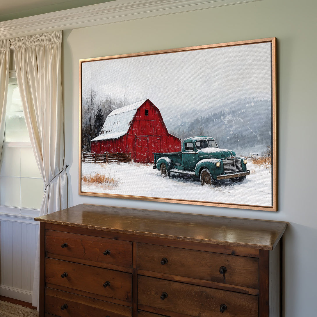Framed Wall Art: Winter scene with red barn, green truck, and snowy landscape. Rustic style, featuring a warm color palette. Perfect for cozy home decor.