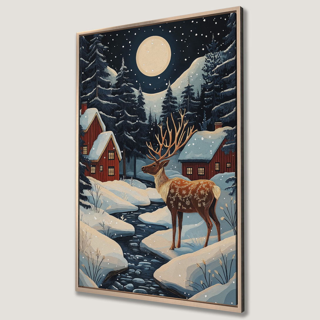 Framed Wall Art: Winter landscape with a deer, snowy cabins, and full moon. Rustic style with a blue, brown, and white color palette. Perfect for cozy decor.