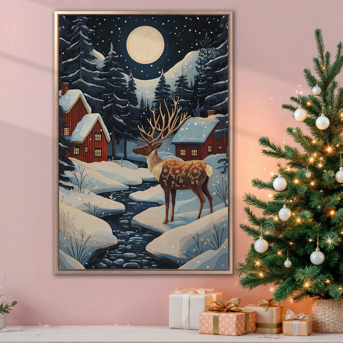 Framed Wall Art featuring a winter scene with a reindeer, houses, and a full moon. Cozy, illustrative style with a blue, red, and white color palette. Perfect for holiday decor.