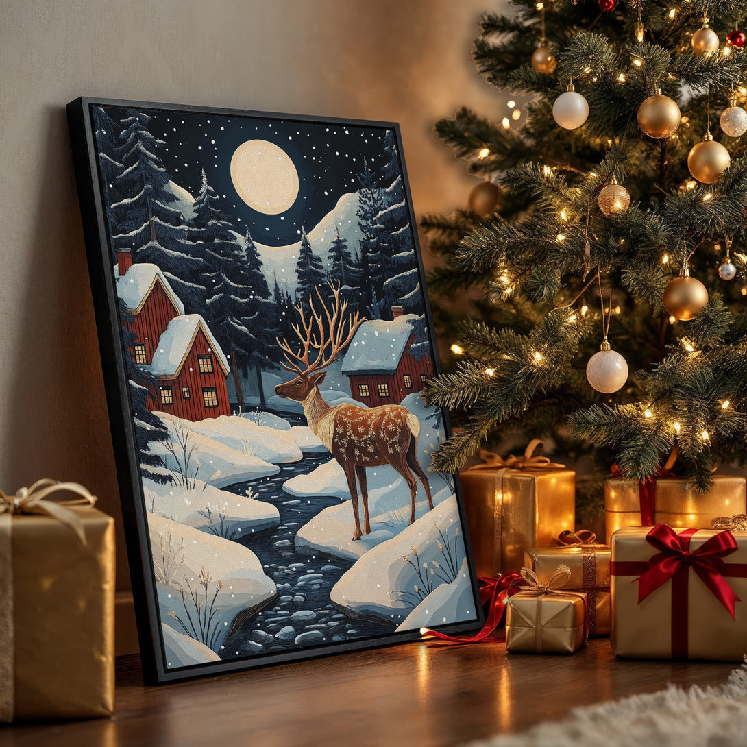 Framed Wall Art: Winter landscape Canvas Print with a deer, cabins, and a snowy scene. Features a cool blue and warm red color palette, perfect for holiday decor.