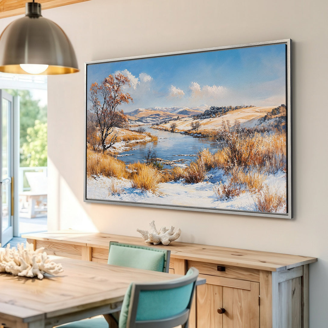 Framed Wall Art: Winter landscape Canvas Print with a serene river scene, featuring a blue, white, and gold color palette, perfect for home decor.