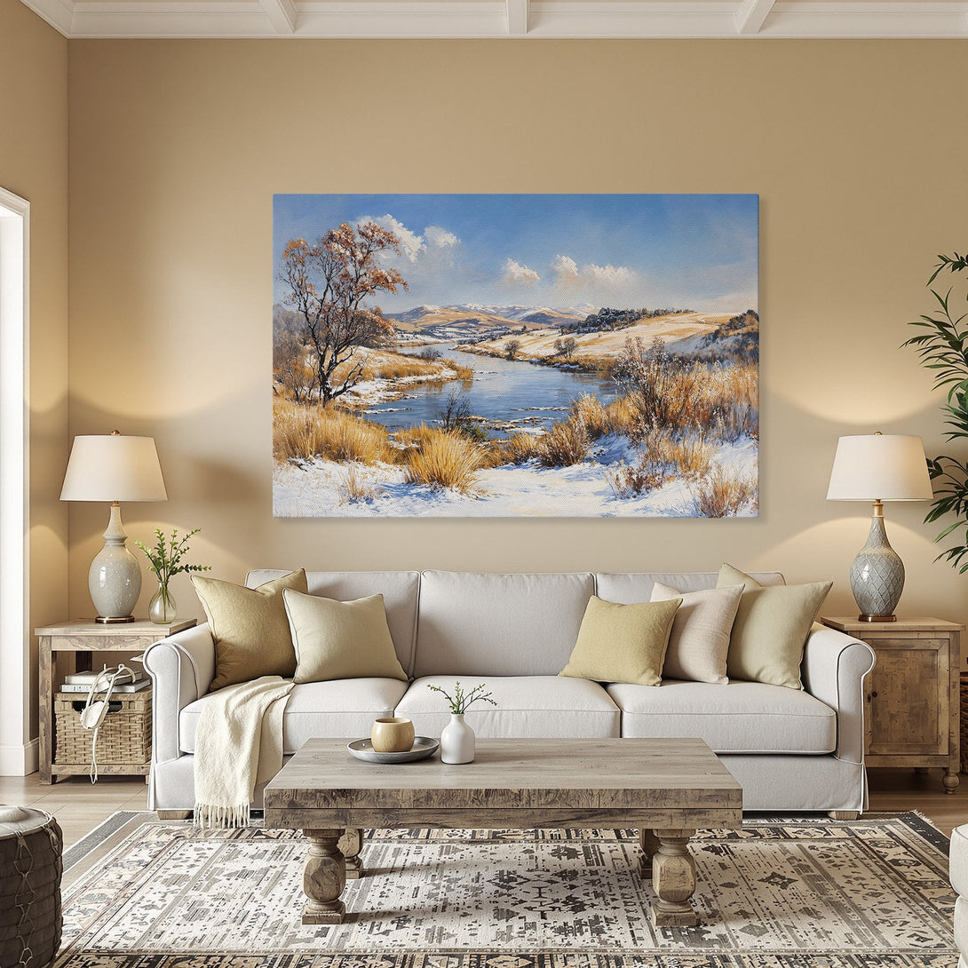 Framed Wall Art: Winter landscape Canvas Print in warm tones. Serene river scene with snow, blue sky, and golden frame. Perfect for home decor.