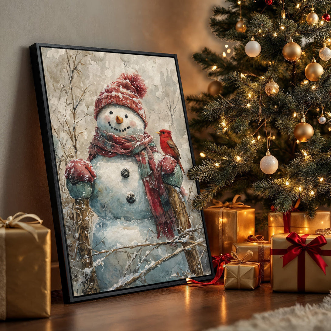 Framed Wall Art: Watercolor snowman print with a red cardinal, perfect for Christmas decor. Soft, wintery color palette. Add festive charm to your home!
