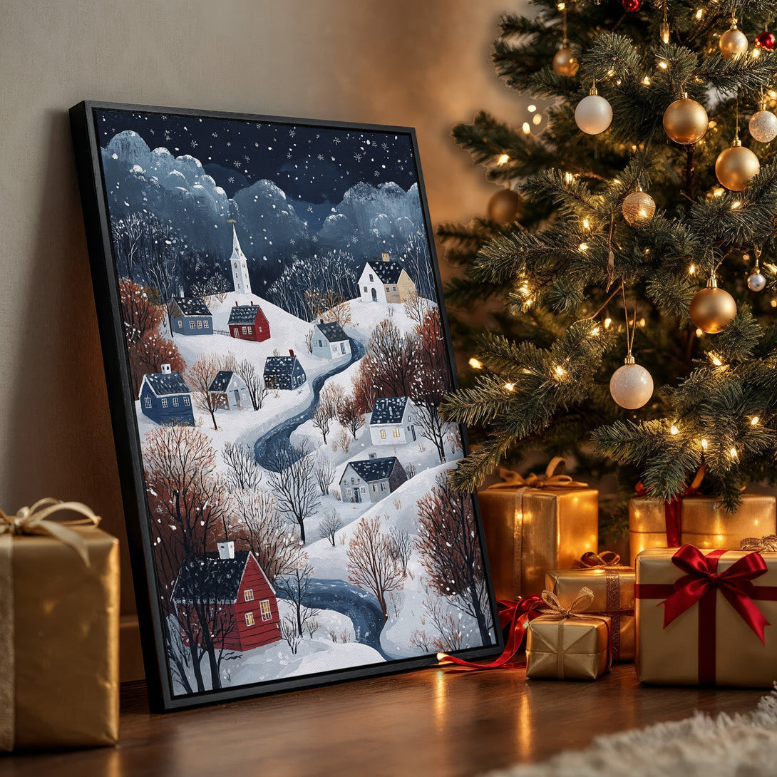 Framed Wall Art: Winter village scene in a cozy, folk art style. Features a snowy landscape with red houses, a dark blue sky, and a warm color palette. Perfect Christmas decor.
