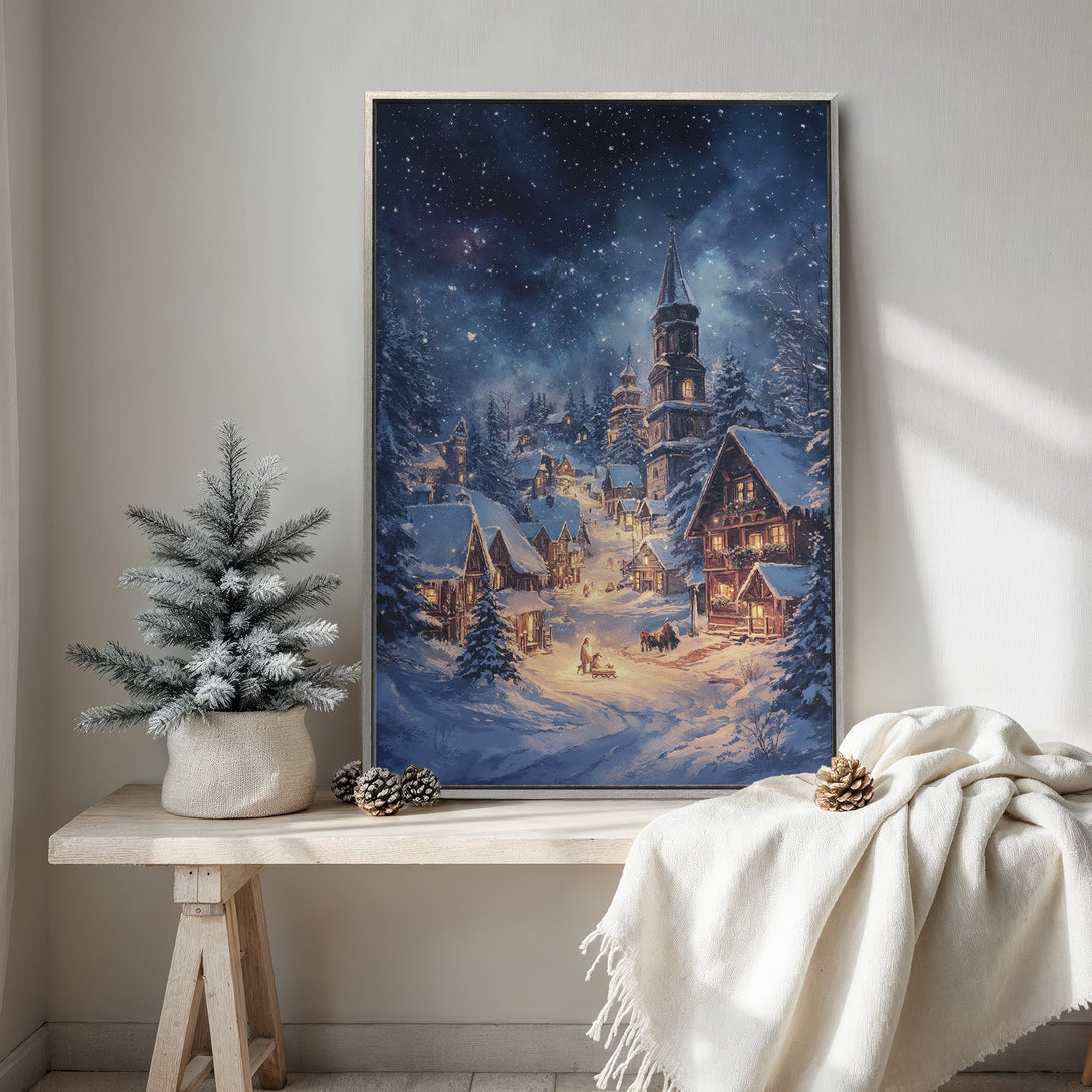 Framed Wall Art: Winter village scene with a snowy landscape, warm light, and a blue and white color palette. Perfect for cozy home decor.