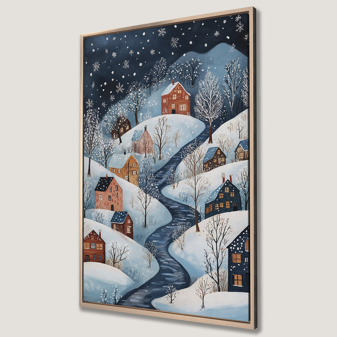 Framed Wall Art: Winter village scene Canvas Print with a cozy, whimsical style. Features a snowy landscape with houses, river, and a blue and brown color palette.