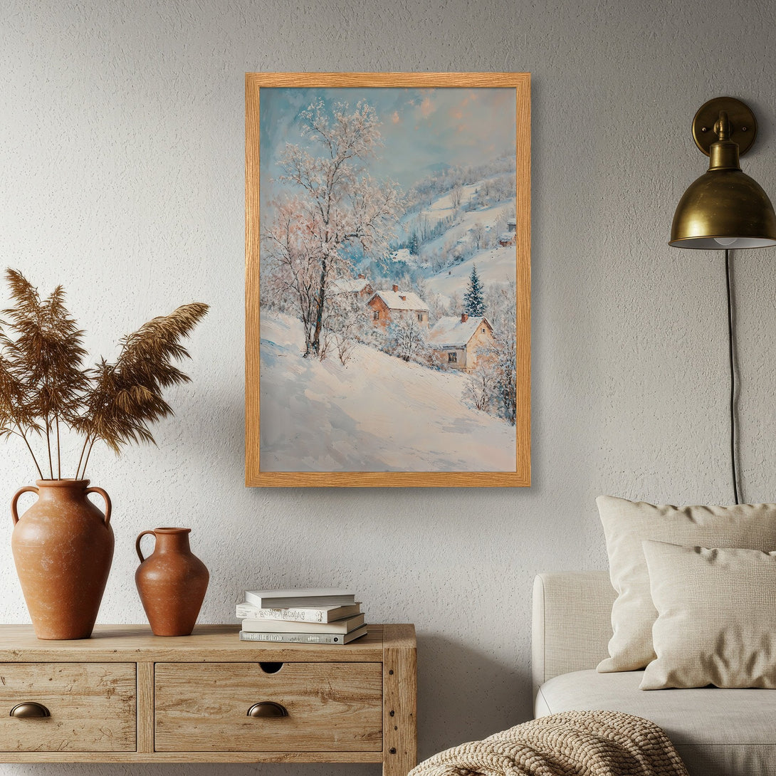Framed Poster of a winter landscape painting. Featuring a snowy village with a soft, pastel color palette. Perfect wall art for cozy decor.