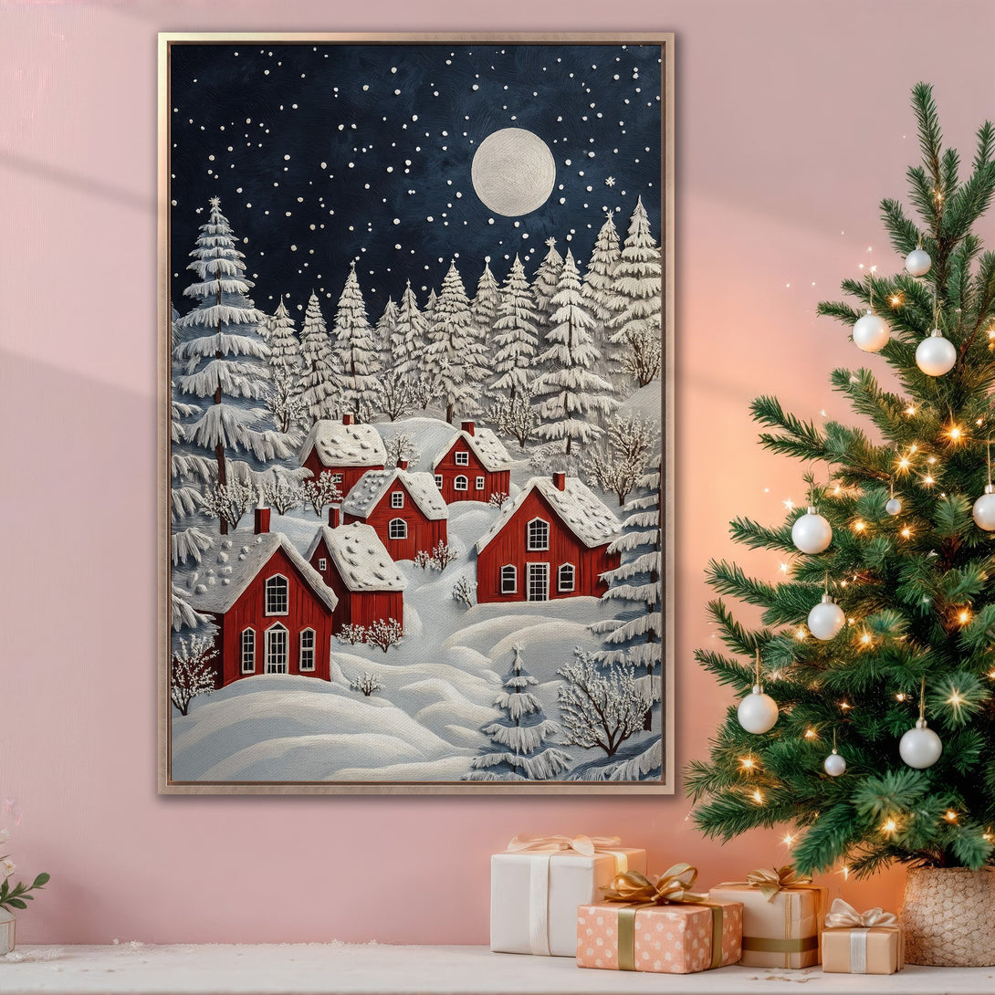 Framed Wall Art: Winter village scene canvas print with red houses, snowy landscape, and a starry night sky. Perfect holiday decor in a cozy interior.