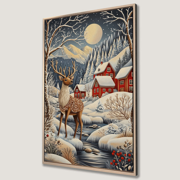 Framed Wall Art featuring a winter scene with a deer, red houses, and a full moon. Cozy, whimsical style with a cool blue and warm red color palette.