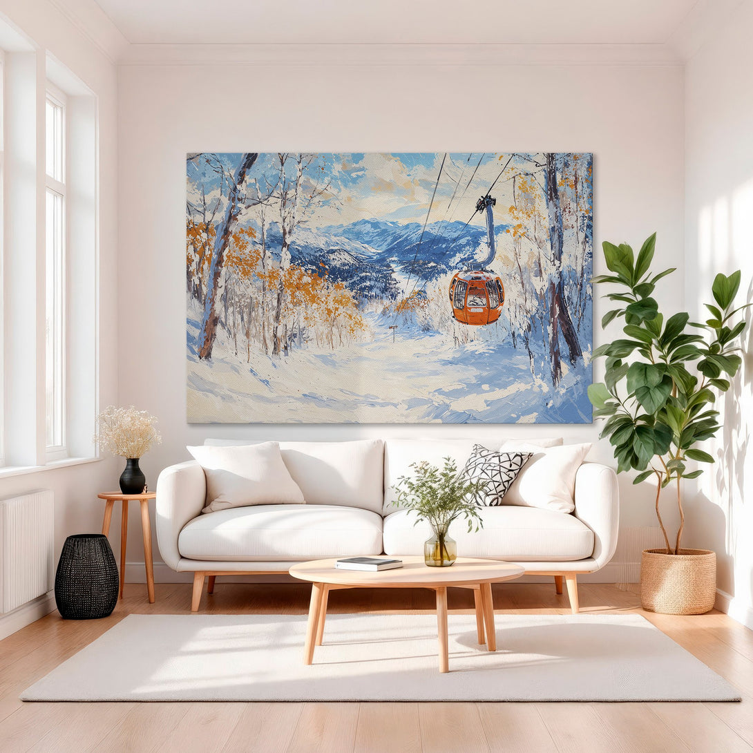 Framed Wall Art: Winter landscape canvas print in a gold frame. Features a ski lift, snowy mountains, and a blue, orange, and white color palette. Perfect home decor.