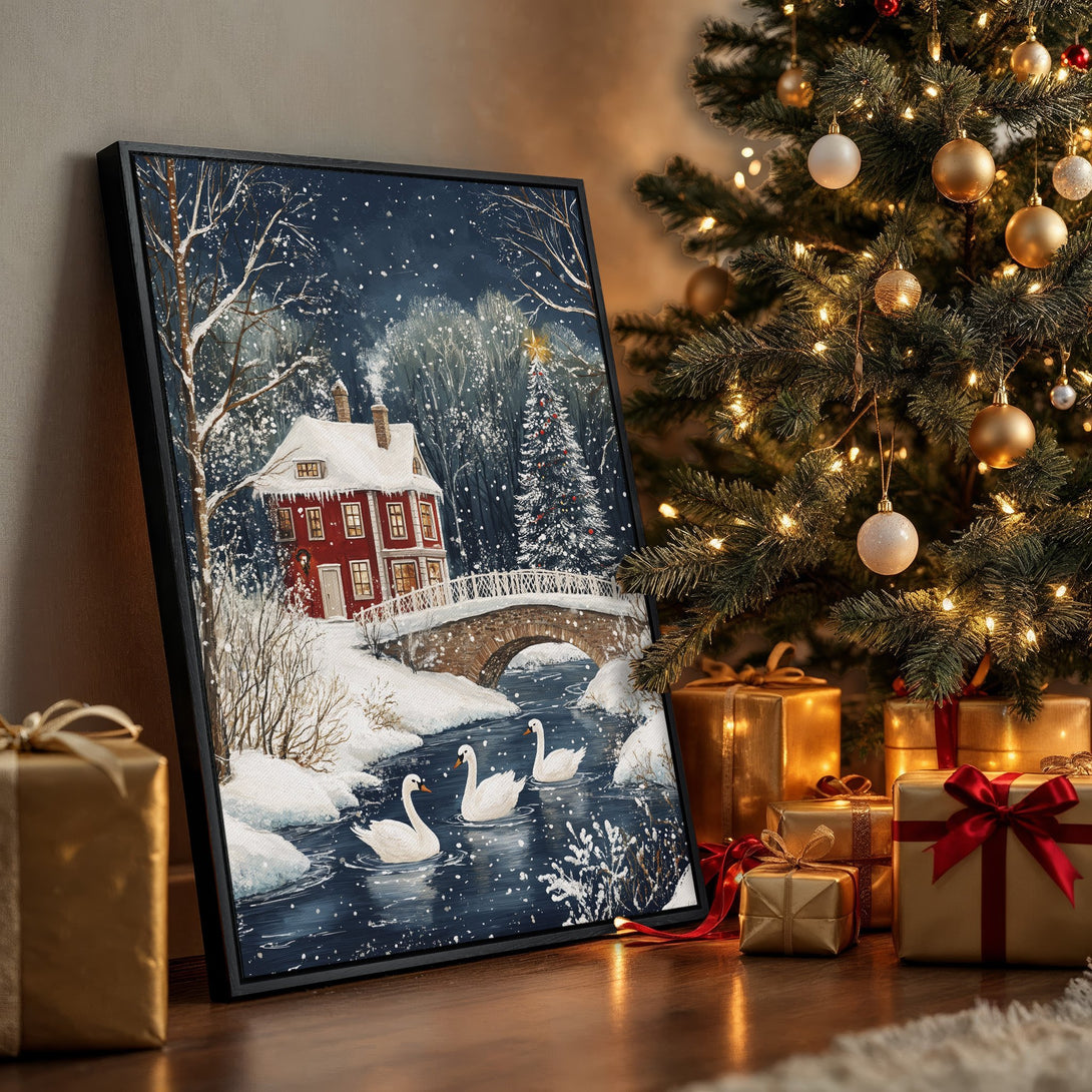 Framed Wall Art: Winter landscape Canvas Print with a red house, swans, & bridge. Blue, white, & red color palette. Perfect for holiday decor.