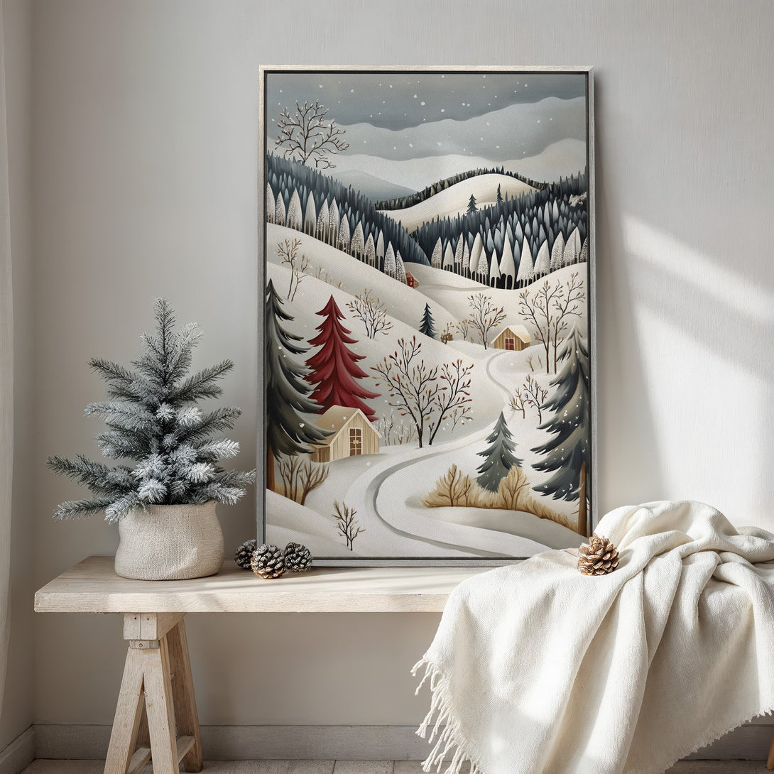 Framed Wall Art: Winter landscape canvas print in muted blues, greens, and whites. Cozy cabin scene in a minimalist, modern style. Perfect for holiday decor.