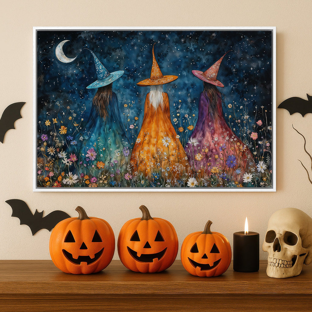 Framed Wall Art: Watercolor painting of witches in a field, with a whimsical style and a blue, orange, and purple color palette. Perfect Halloween decor!
