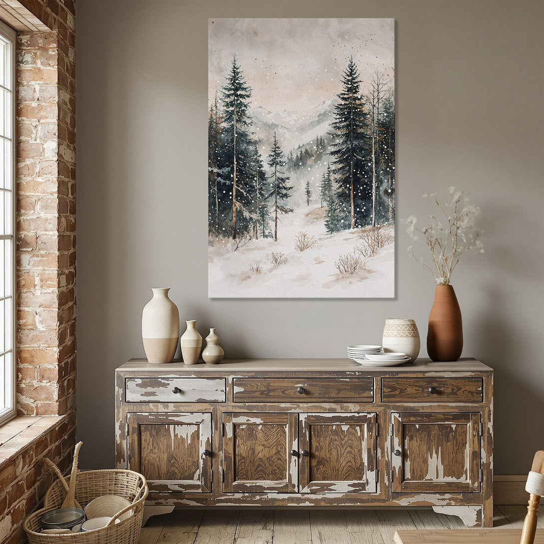 Framed Wall Art: Watercolor landscape print in a dining room. Features snowy forest scene with teal, beige, and gold tones. Perfect for adding a touch of nature.